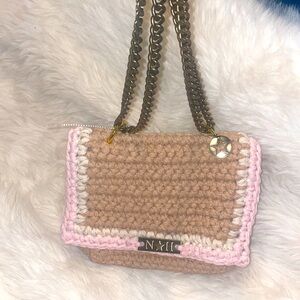 NH Crochet bag in beige, pink, & cream with metal chain strap